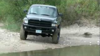 Lifted Dodge Ram off road in water HD