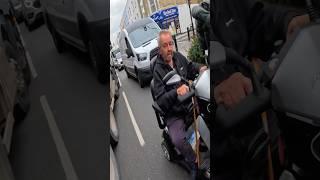 Angry old man on a scooter tells a biker off  @HarveyRidesBikes