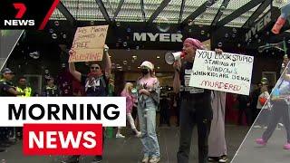 Gunman on the run, severe Sydney storm and Christmas window protest | 7NEWS