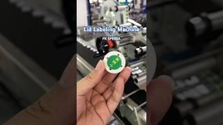 Automatic cap labeling machine #labelapplicator #labelingmachine #toplabeling #lidlabelingmachine