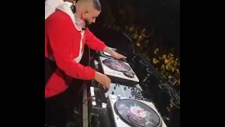 DJ Khaled showing his skills on the turntables!!