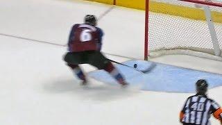 Erik Johnson races back to save the empty net