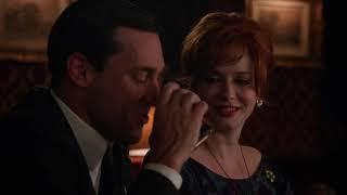 Don Draper and Joan Holloway bond by the bar