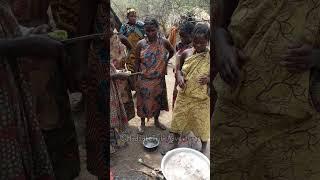 Hadzabe Tribe women are in control of cooking various bush food they find in the nature