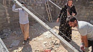 Asghar's hard day in digging hard ground for a well: trying to complete the roof of Ali's house