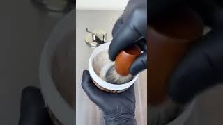 Lathering up some shaving soap for a smooth comfortable shave