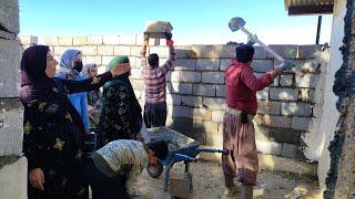 Construction of a nomadic hut by a nomadic family in the absence of the father of the family.