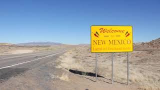 Welcome signs to the Navajo Nation and New Mexico near Four Corners