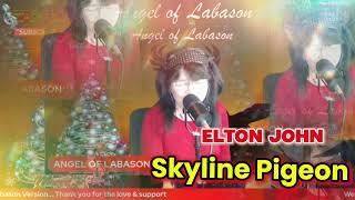 Elton John… Skyline Pigeon | Angel of Labason Verso. |. Cover