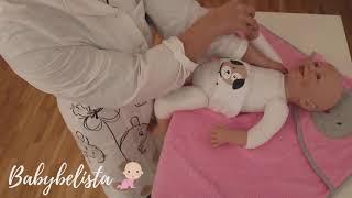 Položaj za kupanje  bebe dok ne otpadne pupčani patrljak