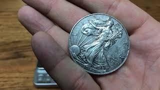 How much does a uncirculated American Silver eagle weigh vs my pocket coin American Silver Eagle?