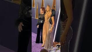 Jennifer Lopez, Gloria Estefan, and Becky G pose on the #AmericanMusicAwards carpet.