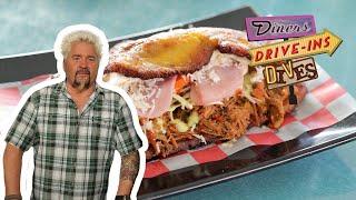 Guy Fieri Eats a Patacon Beef Sandwich | Diners, Drive-Ins and Dives | Food Network