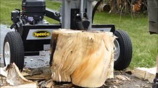 Logsplitter- Speedco 28 ton handling some really gnarly wood