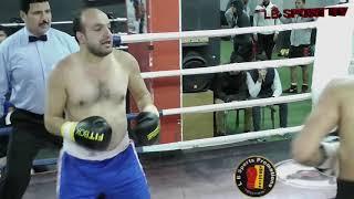 Mostafa Shaban: black trunks vs Mohamed Sayeda: blue trunks