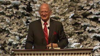 Dr. Jack Trieber preaching "Giving Light to a Dark World" on December 25, 2024