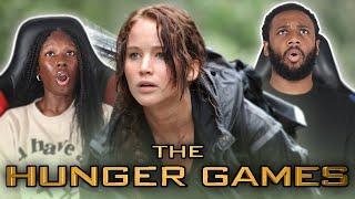 OUR FIRST TIME WATCHING THE HUNGER GAMES | MOVIE REACTION