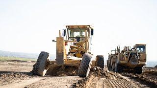 Moving Southern Dirt with Scrapers, Excavators, and Dozers