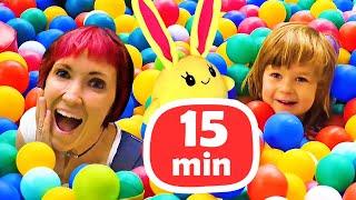 Kids play with dolls & Mommy for Lucky! Toy slide & ball pit. Family fun video.