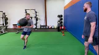 Partner Receive Cross behind Rotational Med Ball Scoop Toss