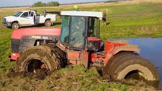 Powerful tractor got stuck in mud! Heavy agricultural machinery works off-road!