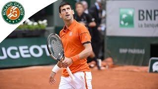 Novak Djokovic touches a ball before it bounces - 2015 French Open