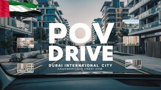 Pov drive Dubai International City neighbourhood apartments and street view