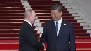 Vladimir Putin meets Xi Jinping in China ahead of Belt and Road Initiative forum | AFP