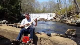 Electric Cigar Box Guitar on the Cocheco River