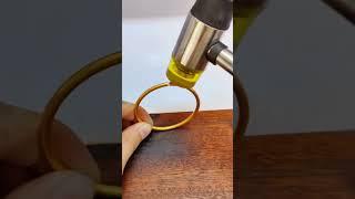 Fastening process of gold bracelets with a rubber hammer