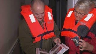 Alastair Stewart inspects the damage of a flood-stricken home