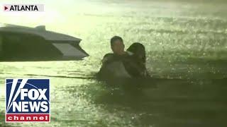 FOX Weather reporter rescues woman from car as floodwaters rise