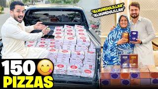 Surprise on 2nd Anniversary of Rajab's Family150 pizzas distributed