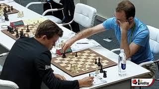 World Champion Magnus Carlsen grinds a Queen endgame against Uruguay no.1 Georg Meier