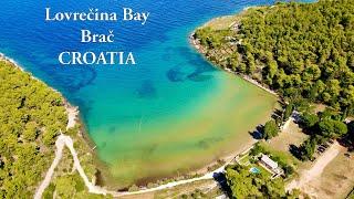 Lovrečina Bay, Brač, Croatia - drone view (4K)