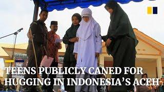 Teens publicly caned for hugging in Indonesia’s Aceh province