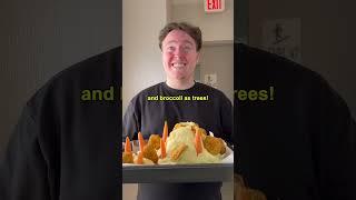 Mashed Potato Volcano with Dino Nuggies and Broccoli as Trees