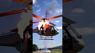 HELICOPTER GOT FIRE AND PILOT IS JUMPING ||