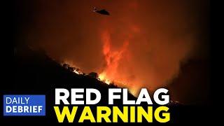 EXTREME WEATHER ALERT: Raging Fires And High Winds Threaten Firefighters And Containment