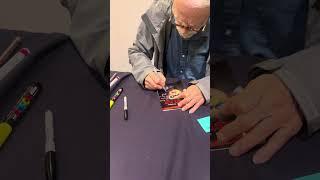 Brad dourif signing more autographs for me.