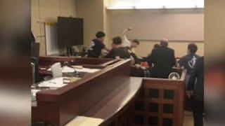 Video shows melee in Bexar County courtroom as murder suspect is attacked, beaten by victim’s fa...