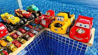 Disney Pixar Cars falling into deep pool, Lightning McQueen, Tow Mater, Mack, Sally, Francesco