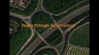 Turning Right at Pease Pottage Roundabout (Large roundabout near Motorway)