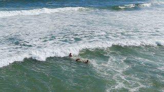 SWIMMER CAUGHT IN RIP CURRENT RESCUED BY SURFER Seaside Park, New Jersey 10/6/24