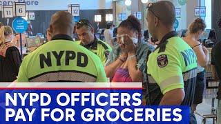 NYPD officers pay for groceries of woman accused of shoplifting