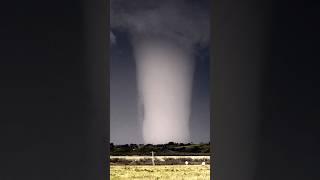 This ghost tornado in SW Oklahoma grew to be quite large outside of Olustee!