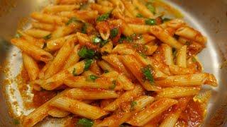 Penne all'arrabiata. A famous Roman dish, now a heritage of Italian cuisine