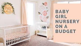 BABY GIRL NURSERY ON A BUDGET // Peach, floral, and feminine decor