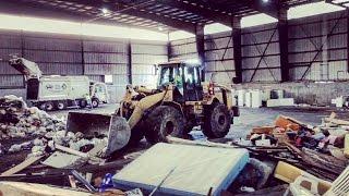 CAT 966H LOADER AT THE GARBAGE DUMP