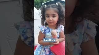 Learn Albanian with Viola. My daughter eating ice cream in Albania